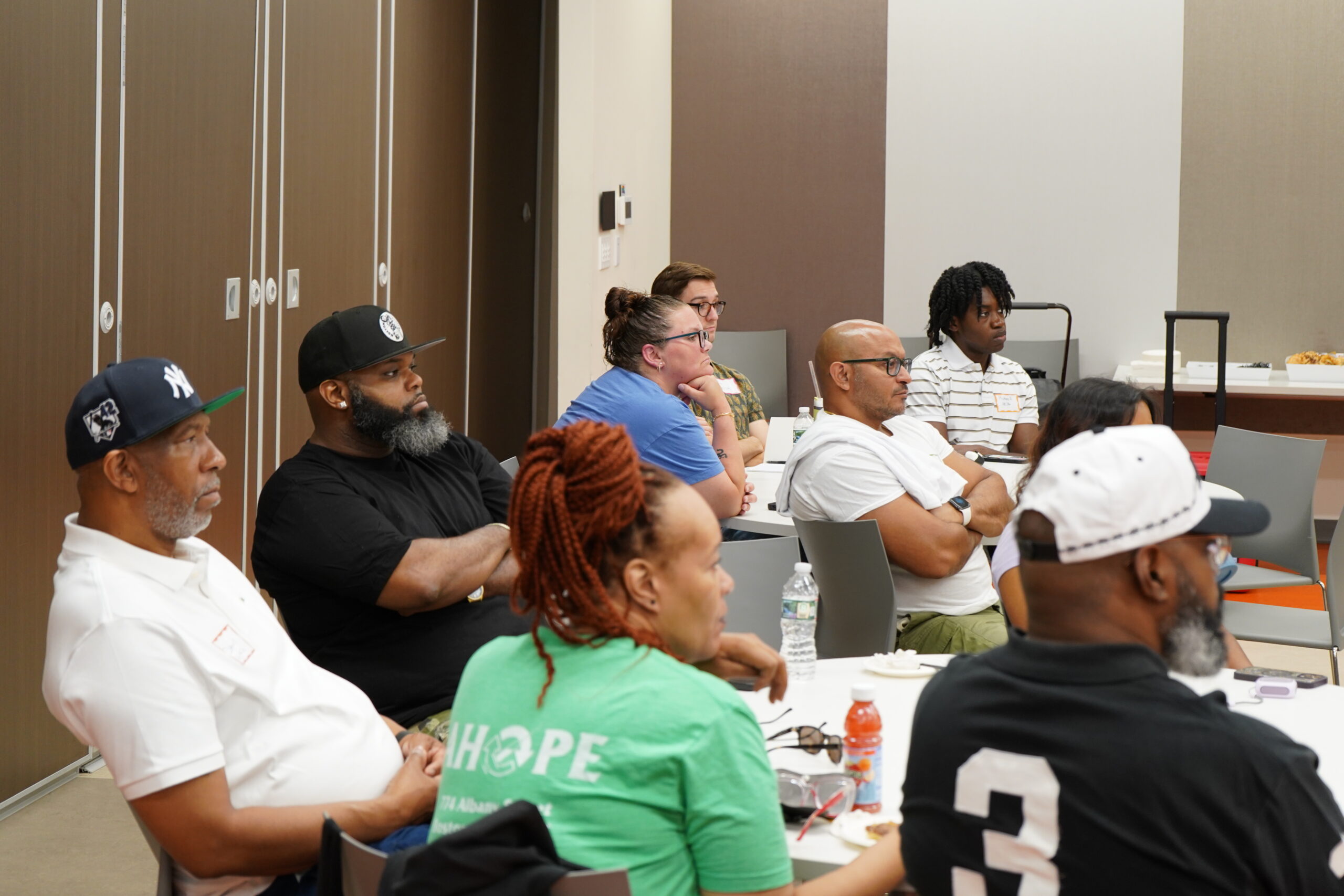 Attendees listening to a presentation at a MAHRWC harm reduction training